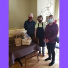 Lesley Johnson, Kim Goldsmith - owner of Main Street Kitchen & Catering, and Jeanne Burt at the raffle drawing.  